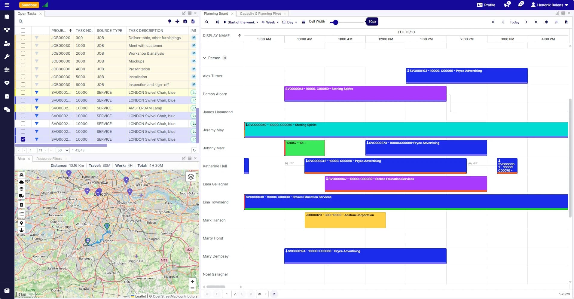 Planning board with open work to drag onto people, travel times between appointments, and the day's route on the map
